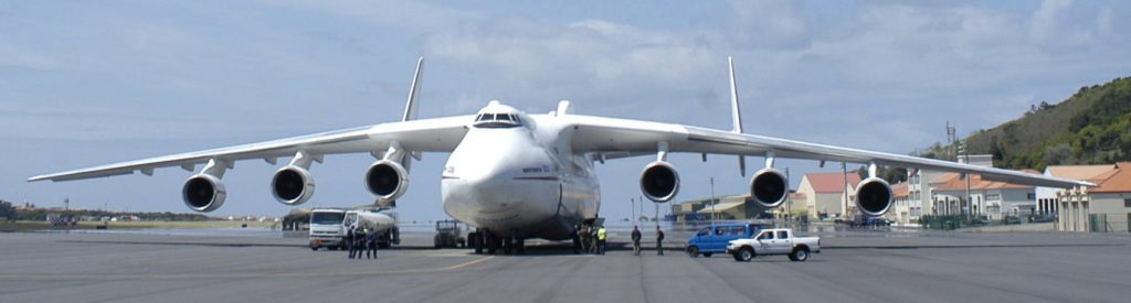 LAJES FIELD, AZORES -- Portuguese and American workers tend to the Antonov An-225 Mriya, or "Dream," April 28 on the flightline at Lajes Field. The "Cossack," as it is known by NATO, landed here to refuel and get service. Currently the world's largest aircraft, the An-225 was designed mainly to transport the Russian space shuttle "Buran" and its components from a service area to a launch site, to Jane's Aircraft Recognition Guide, second edition . It is the only aircraft of its type known to be in existence, according to Jane's. (Photo by Tech. Sgt. Jason Tudor)