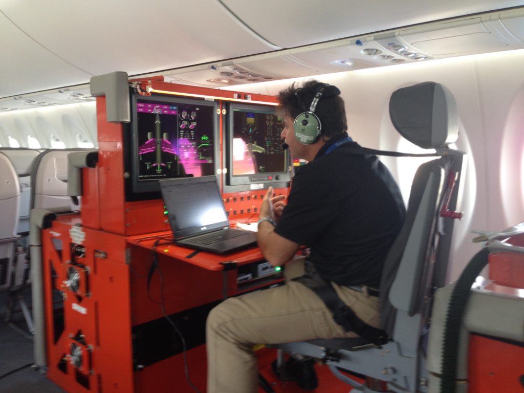 anthony-at-his-test-station-during-flight